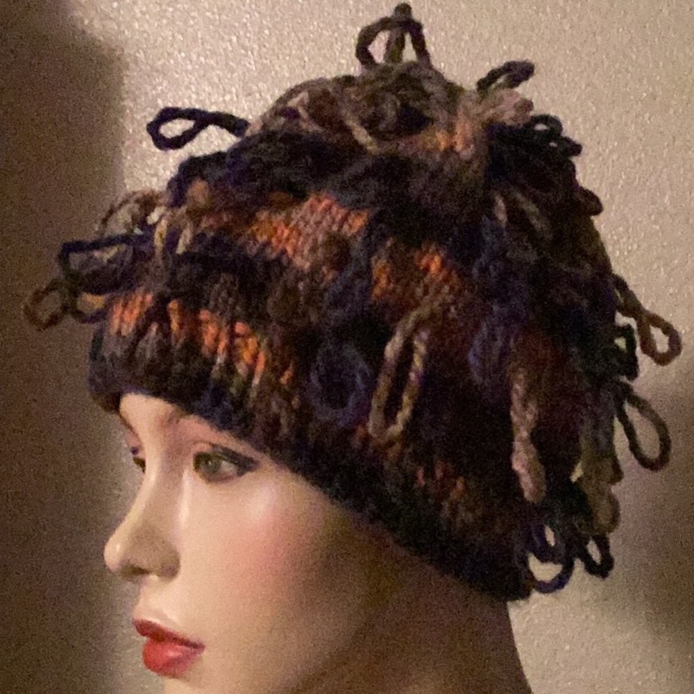 Multi colored looping hand knitted hat
